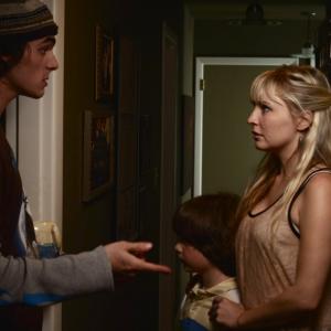RJ Mitte Micah Nelson Lindsey Haun in a scene from Michael Bartletts supernatural thrillerdrama House of Last Things