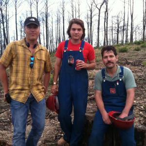 Producer Todd Labarowski Actor Emile Hirsch and Actor Paul Rudd on the set of Prince Avalanche on May 11 2012 in Bastrop Texas