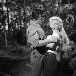 Still of Robert Mitchum and Marilyn Monroe in River of No Return 1954