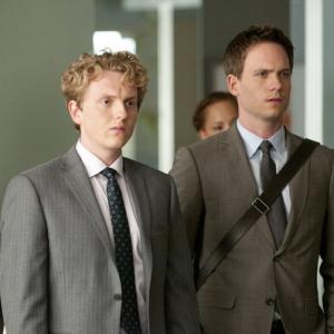 Still of Patrick J Adams and Max Topplin in Suits 2011