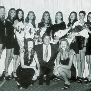 Heidi Albertsen top center and John Casablancas at the Elite Model Look World Final in Miami with Ingrid Seynhaeve bottom right Mariann Molski bottom left and others in September 1993