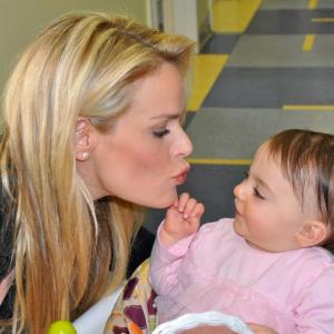 Heidi Albertsen goodwill ambassador of the Lower Eastside Service Center visits with an infant at Su Casa a residential treatment facility in New York City that benefits opiateaddicted pregnant women and children 2012