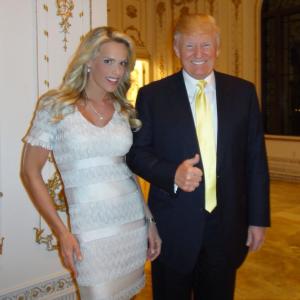 Heidi Albertsen poses with Donald Trump at the MaraLago in Palm Beach Florida in January 2014