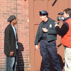 Full Circle Director Matt Mickelson with camera shoots a scene with actors Demetrius Parker left and Chad Ridgely