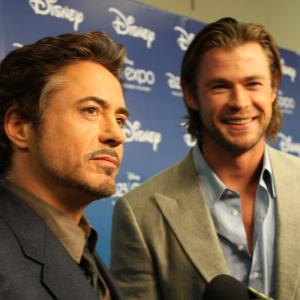 Robert Downey Jr. and Chris Hemsworth at event of Kersytojai (2012)