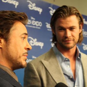 Robert Downey Jr and Chris Hemsworth at event of Kersytojai 2012