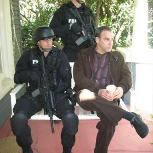 Dotan Baer and Skylar Adams provide a few levels of protection for Mandy Patinkin on Criminal Minds as part of FBI SWAT
