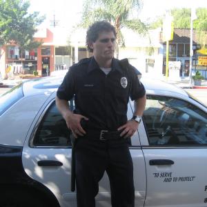 As Rookie Officer Dunbar on the set of the comedy pilot Hobos