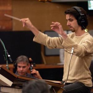Nuno Malo conducting an orchestra for a recording of one of his cues at the Twentieth Century Fox  Newman Scoring Stage