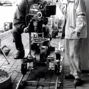 LtoR DP Stephan Recksiedler consulting with Director David Langlois on the set of The Hot Karl1999