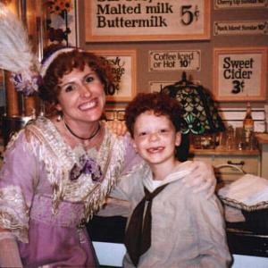 Cameron Monaghan Winthrop Paroo  Molly Shannon Mrs Shinn in the candy store  The Music Man 2002