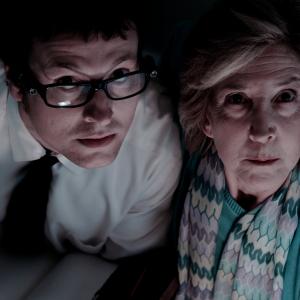 Still of Lin Shaye and Leigh Whannell in Tunas tamsoje (2010)