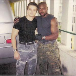 Page Kennedy as Travis in SWAT 2003pictured with Jeremy Renner