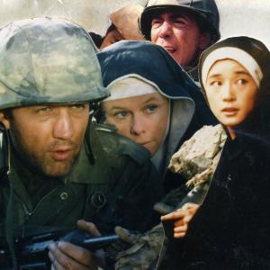 Dennis Christen Eun Kyong Seo Greta Blackburn and Gary Wood in SOLDIERS OF INNOCENCE 1988