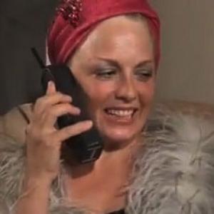 Suzanne Sole as Gloria Tussell in web series Backstage Drama. Gloria's talkin on the phone.