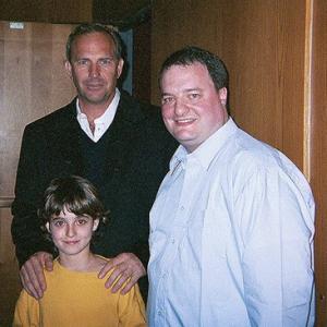 Kevin Costner Jacob Smith and Stephen Gibbons at the Premiere of Dragonfly Feb 2002