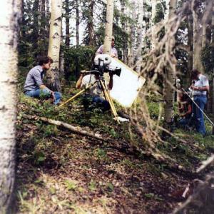 David Winning, Andrew Jaremko (camera), Gordon Merrick (by tree), Donald D. Brown, Frank H. Griffiths. Filming of SEQUENCE, August 12, 1979. West of Cochrane, Alberta.