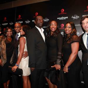 Baker-Simmons with cast for The Houstons and Lifetime's Rob Sharenow