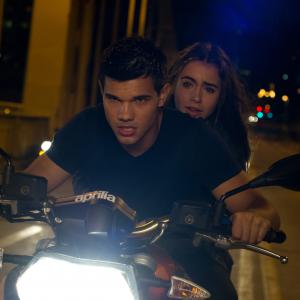 Still of Taylor Lautner and Lily Collins in Abduction 2011