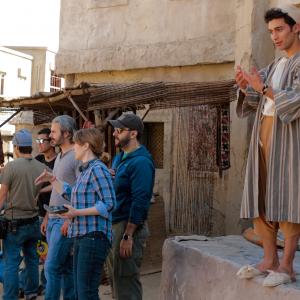 Amanda Tasse (center) directing an exterior crowd scene with DP Damian Horan (left), AD Kaveh Taherian (Right), and Actor Arash Marandi (Far Right).