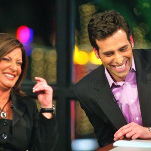 Talk show host Alex Cambert sharing a laugh with the Latina Judge Judy Ana Maria Polo on Mas Vale Tarde con Alex Cambert