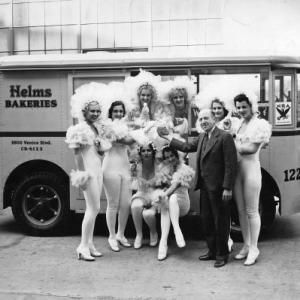 Helms Bakeries truck Marie Deauville at far right standing next to Mr Helms circa 1930s  Sheryl Deauville Collection