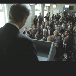 George Fitch Watson as White House Press Reporter in Flash Forward w Peter Coyote (as the President foreground), Joseph Fiennes, John Cho, Courtney B. Vance, Peyton List