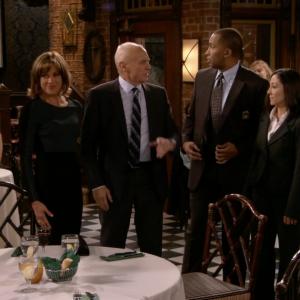 As Agent Miles Hot In Cleveland Left to right Wendy Malick Alan Dale D Elliot Woods  Keiko Elizabeth