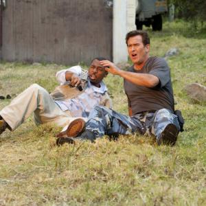 Still of Bruce Campbell and RonReaco Lee in Burn Notice: The Fall of Sam Axe (2011)