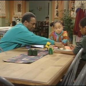Still of Bill Cosby, Raven-Symoné and Deon Richmond in The Cosby Show (1984)