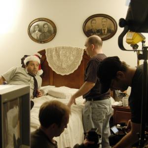 Jon Teboe center directs Oscar Quintero as Colin Menendez in the comedy short Heirloom as Cinematographer Christopher Calvert right sets up the shot January 2006