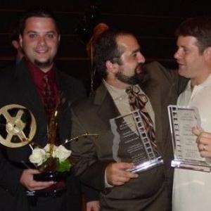 David Boorboor Middle Sean Astin Right and Joseph Nasto left receiving award for best director Atlan