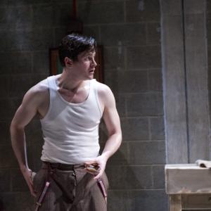 Kieran Bew as John in Partrick Marbers After Miss Julie at the Young Vic Theatre
