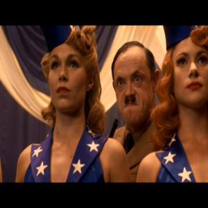 Hitler (James Payton) sneaks up on Captain America...it won't end well for ole Adolf.