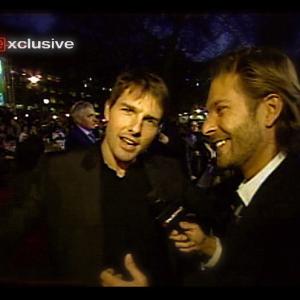 DAVID GIAMMARCO and TOM CRUISE sharing a laugh at their World Tour stopover in London for the Odeon Leicester Square Premiere of 