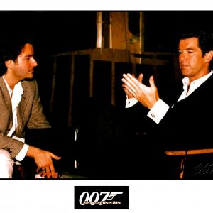 DAVID GIAMMARCO and PIERCE BROSNAN during production of TOMORROW NEVER DIES 1997 Frogmore Studios St Albans England