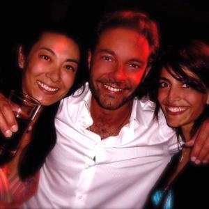 David Giammarco Annabel Wilson left and Caterina Murino on location filming Casino Royale snapped on the dancefloor at the Bambu Nightclub in Nassau Bahamas