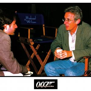 Director ROGER SPOTTISWOODE and DAVID GIAMMARCO during production of 