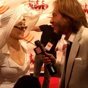 YOKO ONO and DAVID GIAMMARCO, Red Carpet Host, for the CIRQUE DU SOLEIL World Premiere of THE BEATLES 