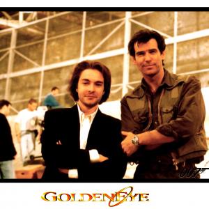 PIERCE BROSNAN and DAVID GIAMMARCO during filming of 