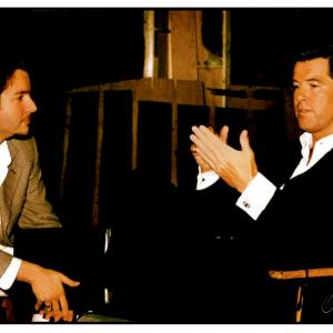 DAVID GIAMMARCO and PIERCE BROSNAN during production of TOMORROW NEVER DIES 1997 Frogmore Studios St Albans England