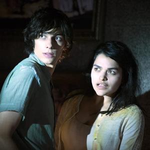 Still of Devon Bostick and Eve Harlow in The 100 2014