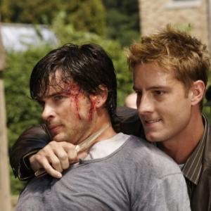 Still of Tom Welling and Justin Hartley in Smallville 2001