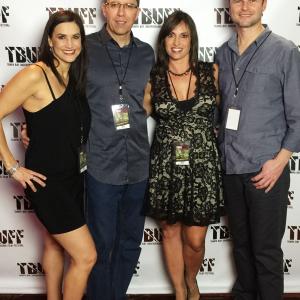 Wade Ballance and Mark Kochanowicz with Tampa Bay Underground Film Festival TBUFF organizers Kelly  Chris for the screening of Assumption of Risk 2014