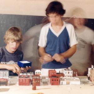 Steve Frazier Jon Teboe and Dan Frazier build the miniature model city for The Yellow Ranger in Dan and Steves basement 1982 San Antonio TX