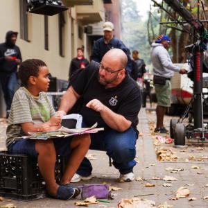 Director Konstandino Kalarytis and actor Paballo Koza on location in Hillbrow, South Africa on the film Dora's Peace.