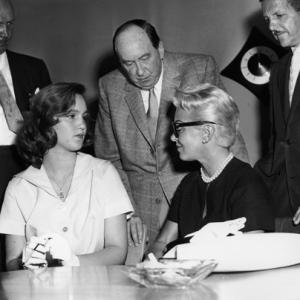 Lana Turner with her daughter Cheryl Crane and attorney Jerry Giesler at the Johnny Stompanato murder trial