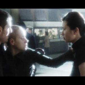Still of Tom Cruise, Samantha Morton, and Joan Wong in Minority Report.