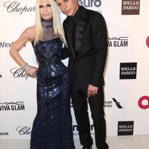 Nolan Funk attends event Elton John Oscar Viewing Party with Donatella Versace