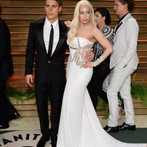 Nolan Gerard Funk attends event for Vanity Fair Oscars with Lady Gaga